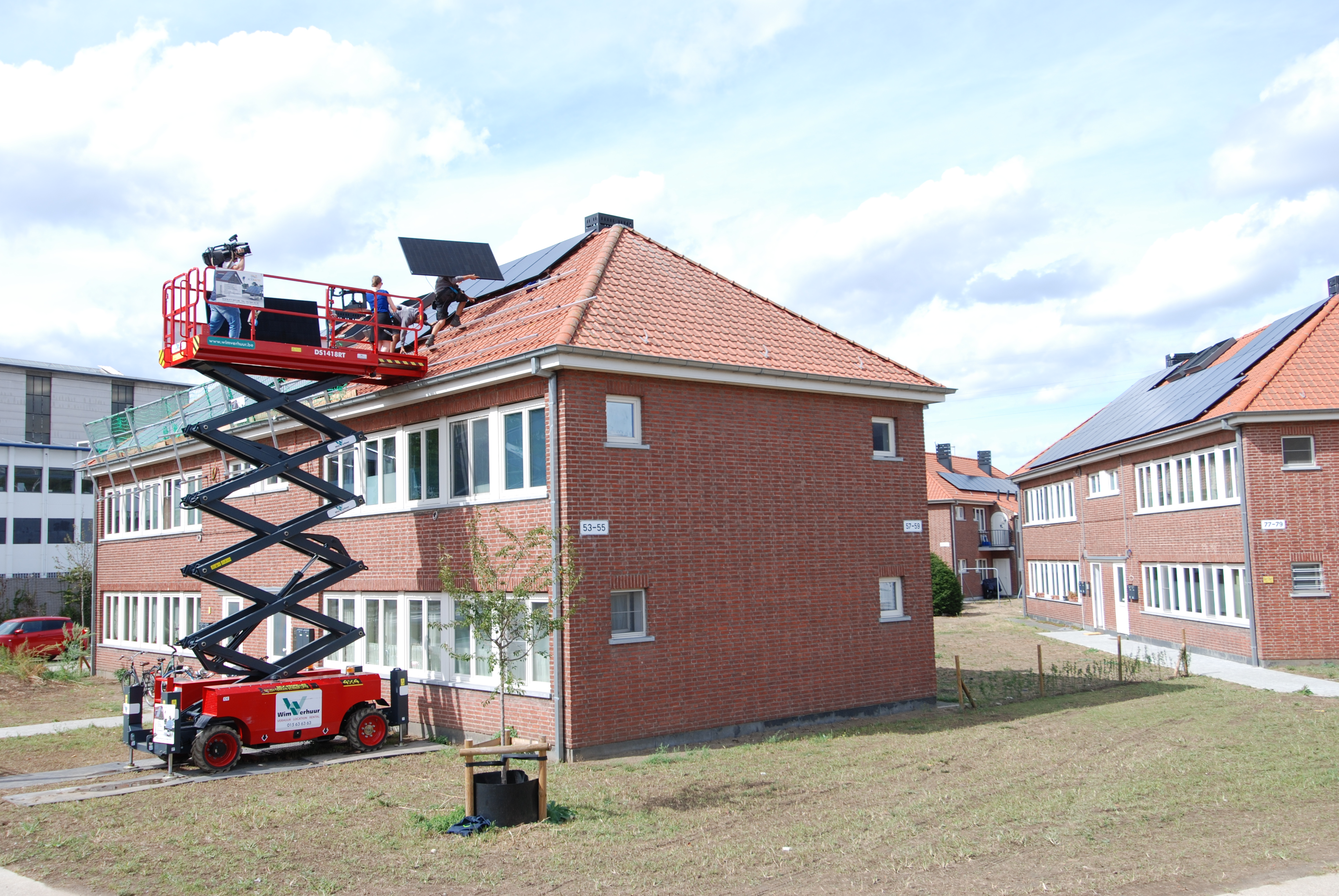 Installing solar panels in an energy community in social housing district in Mechelen, Flanders